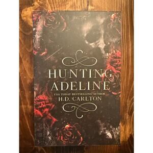 Hunting Adeline soft cover book. New-never opened/read